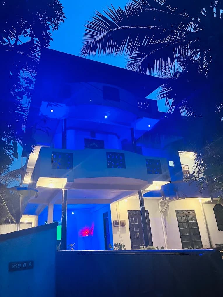 Front of the building at dusk